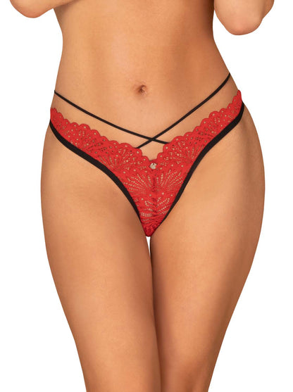 Mettia a red lace thong with black, elastic straps that are connected above the bottom by a striking metal ring