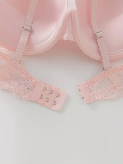 Detail vom Rückenverschluss des rosa Damen BHs mit mehrstufigem Hakenverschluss